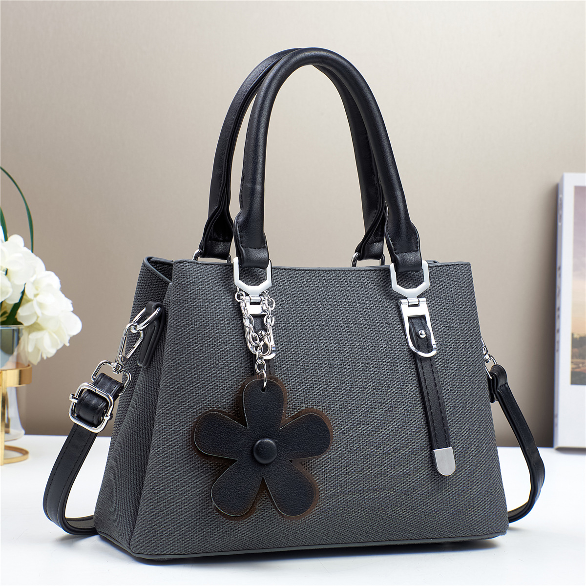 Womens Fashionable Textured Handbag with Flower Charm